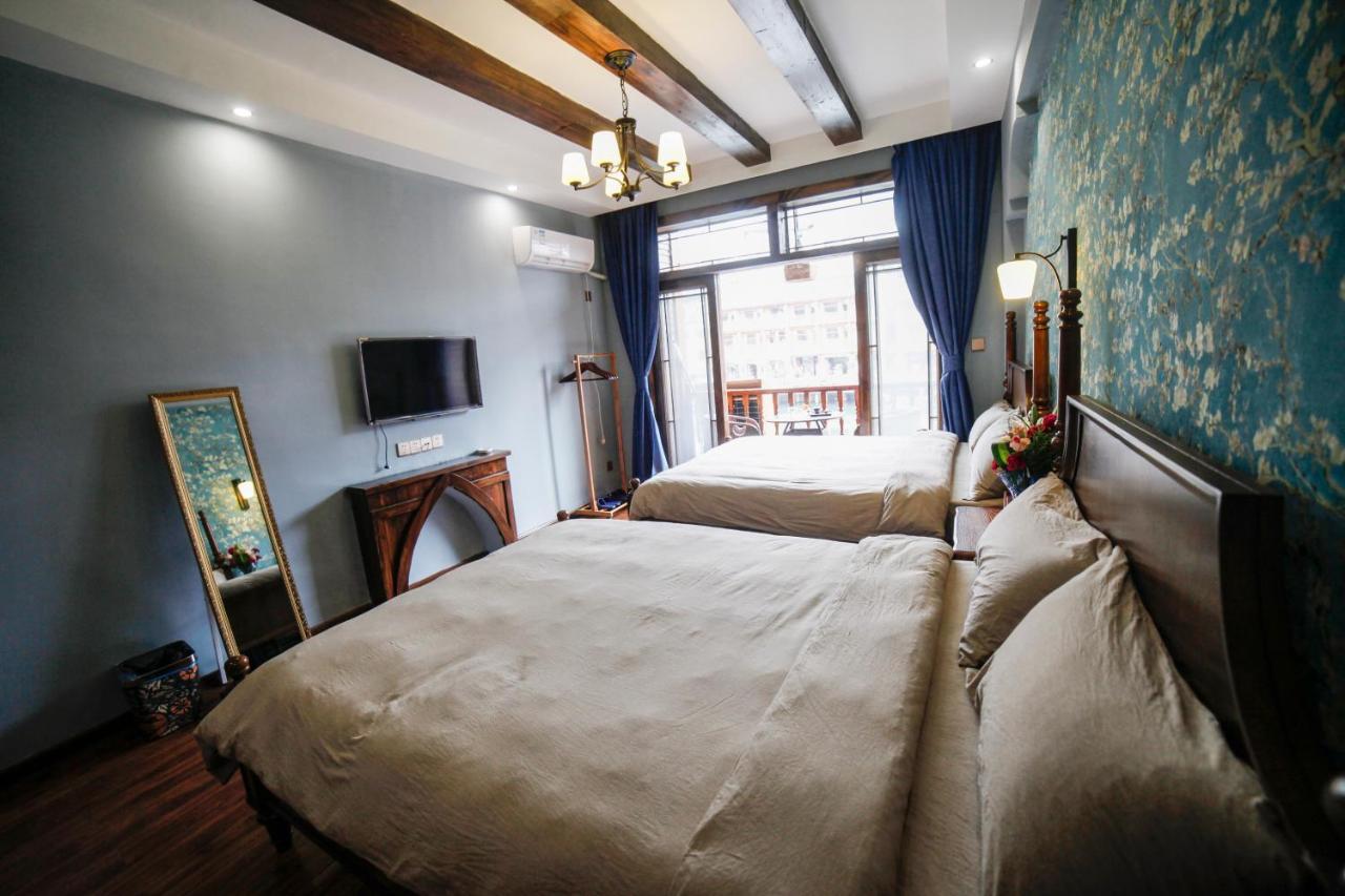 Flower Time Inn Fenghuang Buitenkant foto