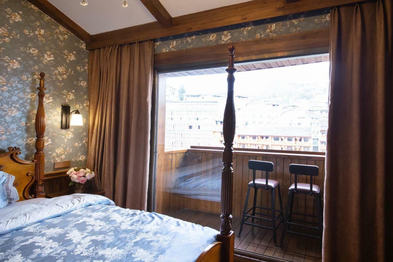 Flower Time Inn Fenghuang Buitenkant foto